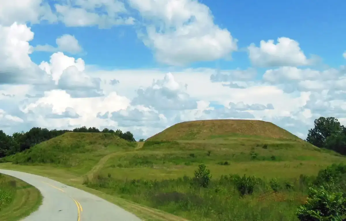 The Great Temple Mound and Lesser Temple Mound rising above the grass at Ocmulgee